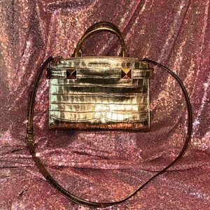 MK Kaila Small Gold Satchel with embossed leather.